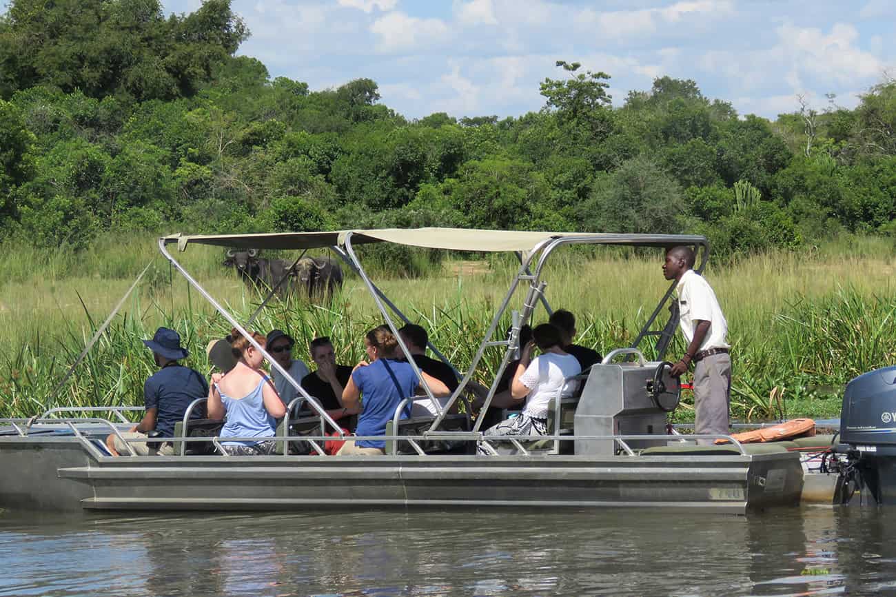 Murchison Falls National Park - How to Plan a Safari in Murchison Falls National Park in Uganda Bird watching from the boat at the Murchison Falls National Park, Uganda
