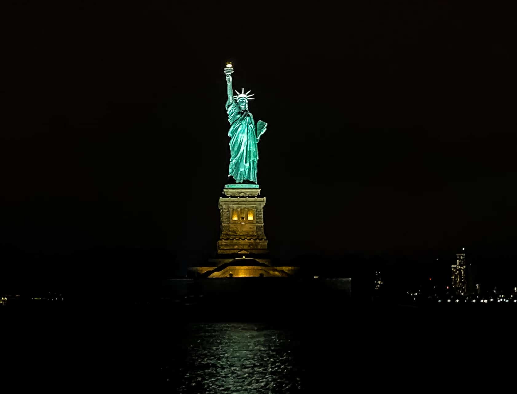 New York City in Winter - A Guide to Visiting New York City in Winter Evening boat tour to the Statue of Liberty in New York City, USA