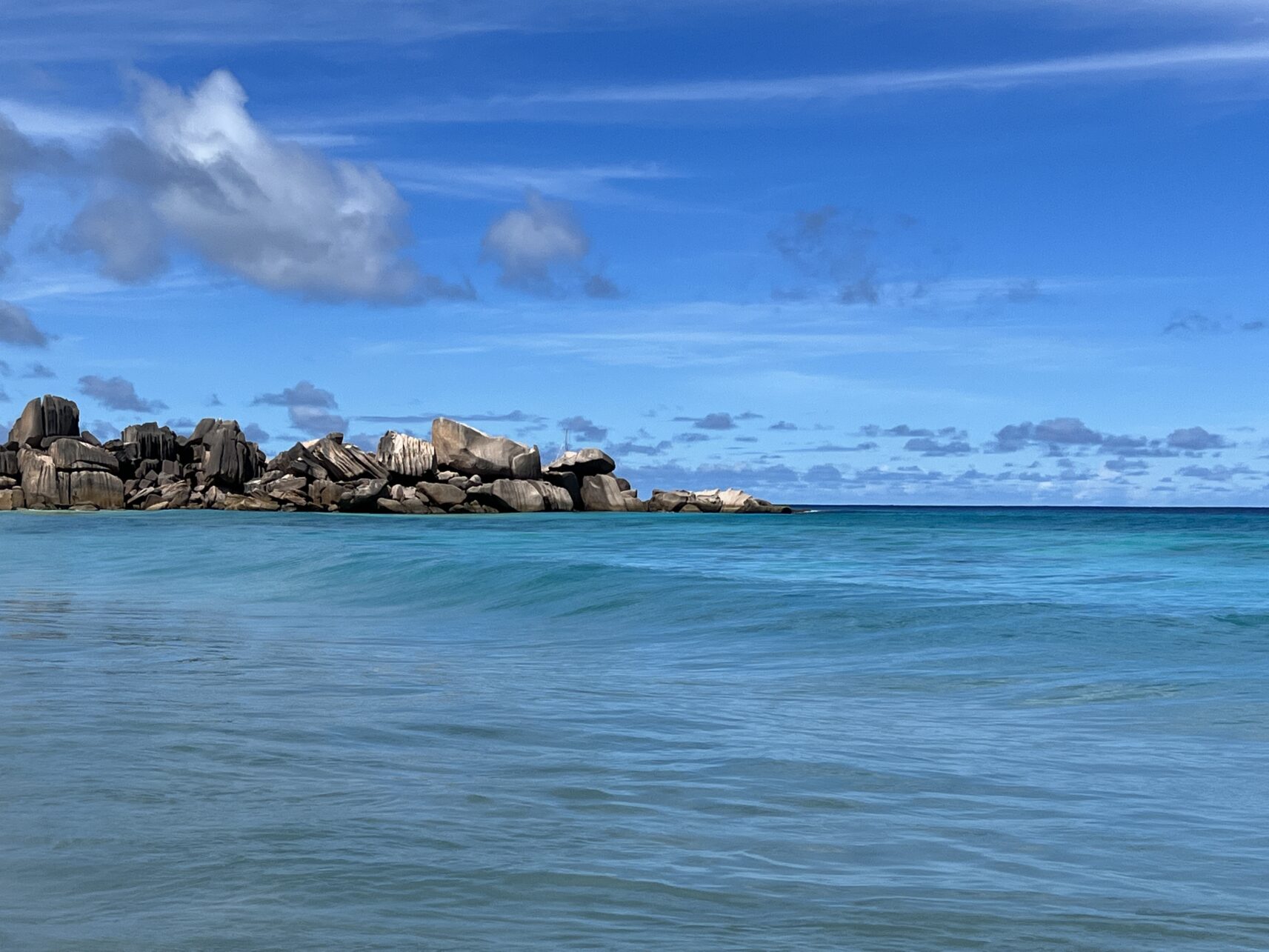 seychelles travel tips - Top Seychelles Travel Tips: Not to Miss Islands and Beaches Granite rocks in the sea at Grande Anse, Seychelles.