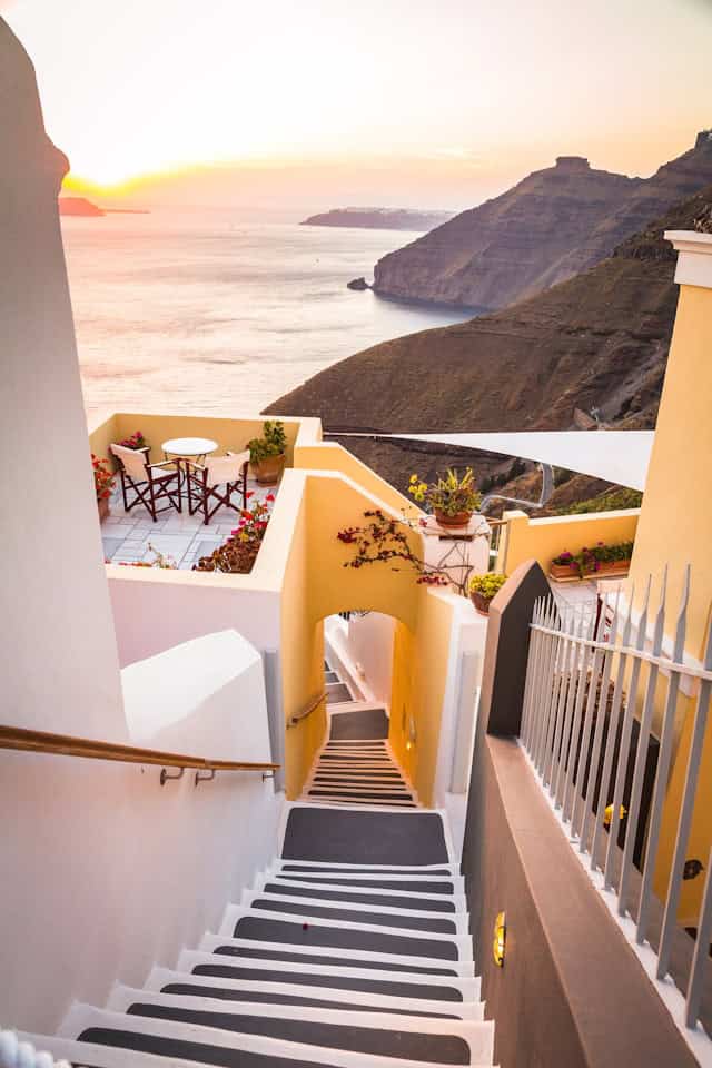 Bucket List Destinations - Top Bucket List Destinations To Travel to in Peak Summer Season Sunset in Santorini, one of the most a bucket list destinations in Greece