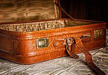 city break packing list with suitcase
