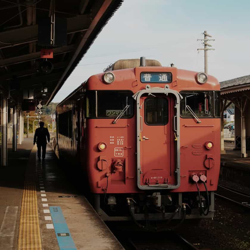 Japan's railway system - How to Navigate Japan's Railway System: Types, Tickets & Tips Orange train in Japan