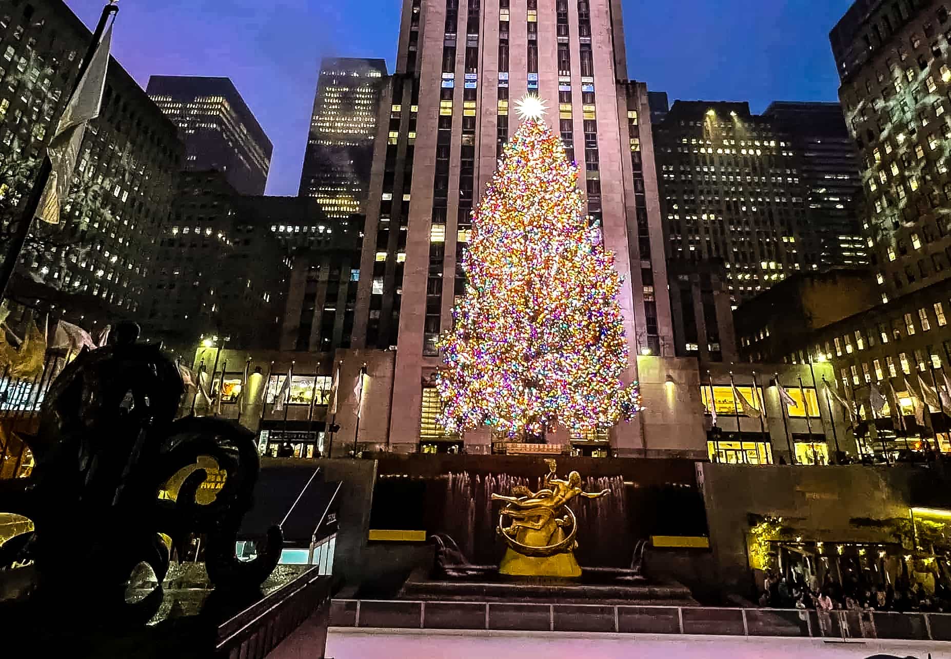 New York City in Winter - A Guide to Visiting New York City in Winter The famous ice rink and Christmas Tree at the Rockefeller Center in New York City, USA.