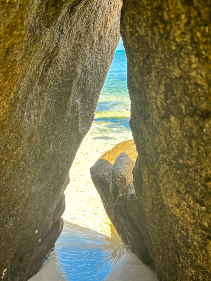 Saint Anne - granite rocks with a view of the turquoise sea.