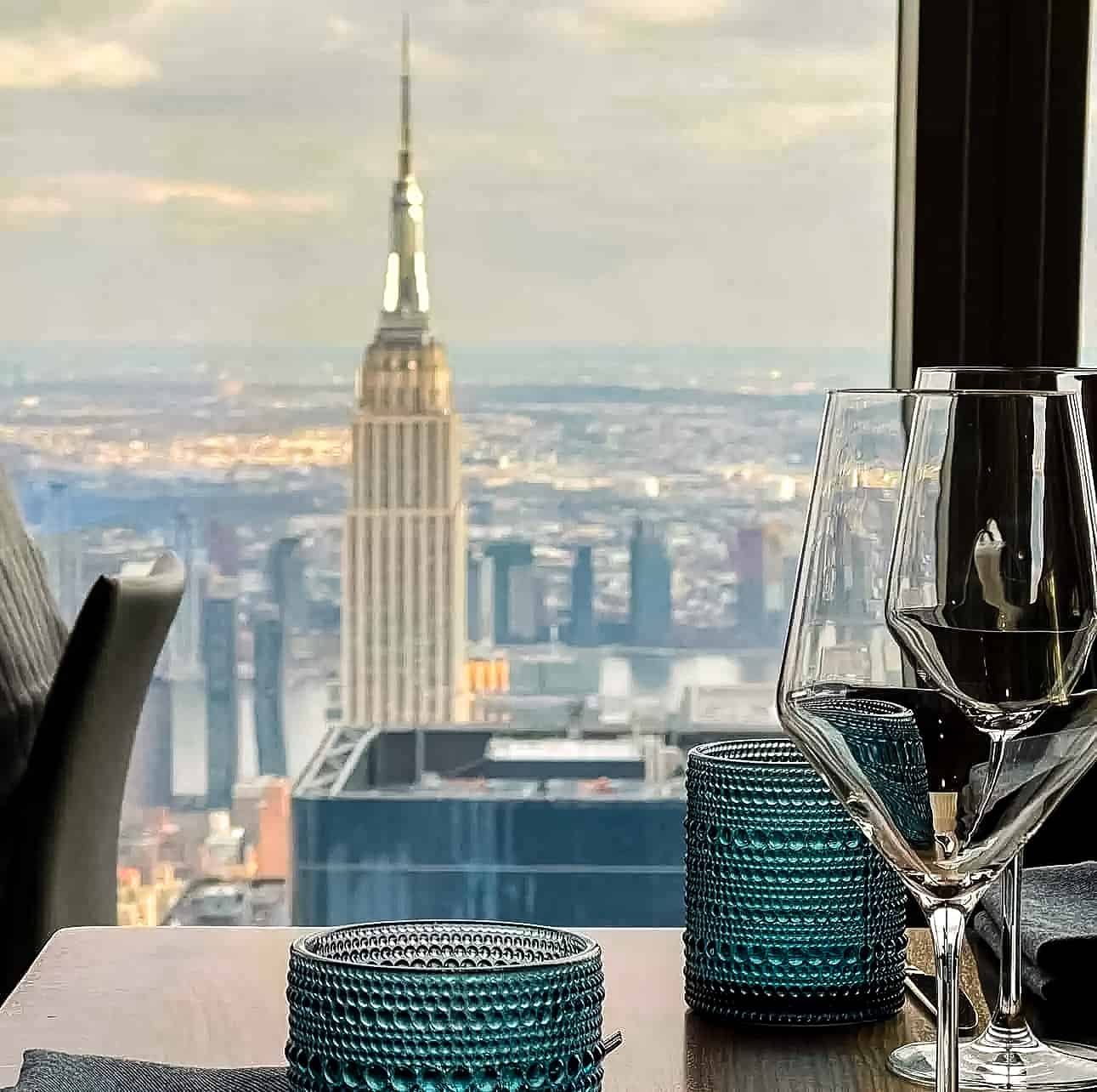New York City in Winter - A Guide to Visiting New York City in Winter View of the Empire State Building from The Peak restaurant in New York City, USA.